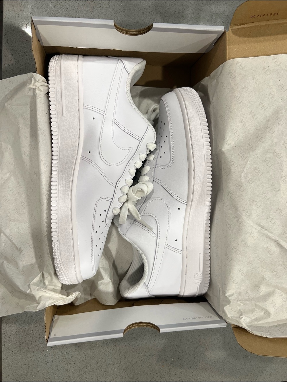 Nike All-White Leather Low Top Sneakers
